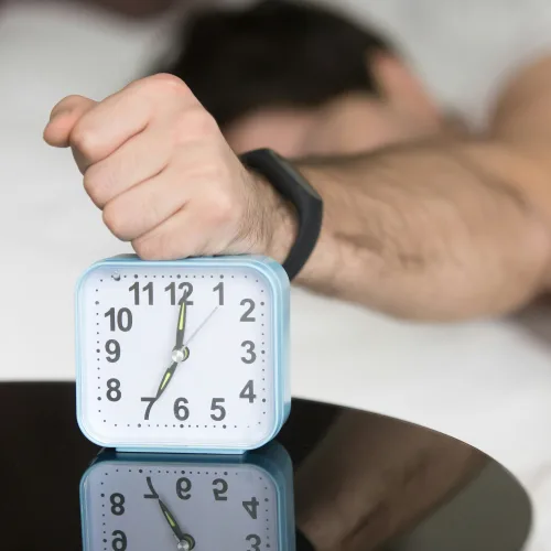 Man with alarm clock